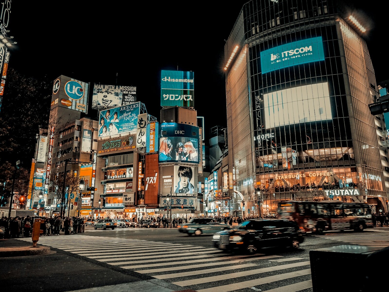 cars on road in city during night time